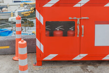 Red Cabinet In The Harbor Where Fire Extinguishers Are Stored.