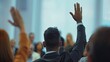 © Asad - Unrecognizable Businessman Person Of Multi-Ethnic Businesspeople Raising Their Hands During A Presentation Seminar For Asking Question At Their Company