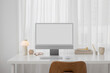 © Artem Podrez/Stocksy - Mockup of a modern computer with white screen in a stylish office
