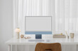 © Artem Podrez/Stocksy - Mockup of a modern blue computer with white screen in a stylish office