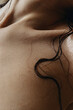 © Anastasia Mihaylova (Shpara)/Stocksy - Closeup photo of woman's neck skin texture and collarbone