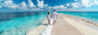 © SnapVault - Banner of A young couple enjoys their summer vacation walking along a tropical beach on a sunny day on white sand,adventurous spirit to travel. copy space