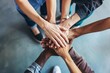 © H_designs - Team Of Diverse Workers Put Hands Together
