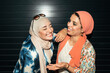© Santi Nuñez/Stocksy - Portrait of muslim women friends having fun