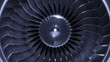 © Bruno Tornielli/Stocksy - A large jet or airplane engine turbine with lot of silver blades.