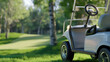 © Derrick - Golf cart at golf course on sunny day.