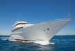 Luxury private motor yacht under way sailing at sea