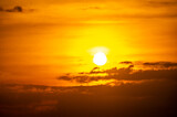 Fototapeta Zachód słońca - Fiery horizon, dramatic ocean sunset in vibrant hues over dark waters, nature breathtaking photo reflecting artistry of dusk's tranquil spectacle and coastal beauty