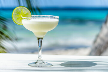 A vibrant lime green margarita in a salt-rimmed glass, beautifully accented with a lime slice, set against a minimalist sunny outdoor background for a food photography shoot.
