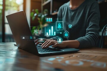 Businessperson working on a laptop with digital marketing and analytics icons.