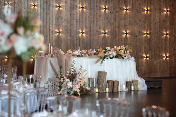 Wall Mural - Main table at a wedding reception with beautiful fresh flowers. Wedding day.