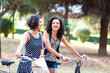 Joyful friends on a leisurely bike ride in the park
