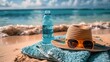 Serene beach scene with plush azure towel and straw hat on sunny shore
