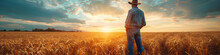 Farmer At The Field Looking At The Horizon, Man Standing In Cowboy Hat Admire Sunset