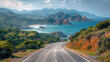Scenic coastal road with lush greenery leading towards a beautiful ocean bay with rocky cliffs under a clear sky