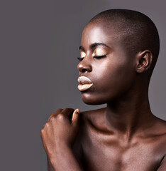 Wall Mural - Face, mockup and closeup of black woman for makeup, beauty and cosmetics isolated on gray background. Person, African lady and eyeshadow with lipstick in studio for skin care, cleansing or treatment