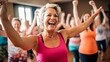 © liliyabatyrova - A group of beautiful Cheerful happy middle-aged Women, Friends are enjoying fun energetic zumba dancing in the gym. Training, Coach, Sports, Fitness, Motivation, Healthy Active Lifestyle concepts.