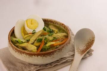 Wall Mural - Chicken Sotanghon is Filipino Glass Noodles Soup with Egg.