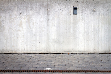 Wall Mural - Gray concrete wall background and sidewalk