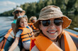 © Ricky - selfie of happy family on boat wearing orange life jackets, close up on blond daughter smiling