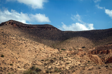 Wall Mural - View from a road near Matmata city, Kebili Governorate of Tunisia