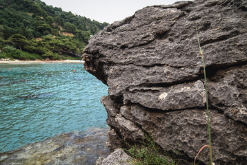 Sticker - Rocky Ionian Sea shore near Sinarades village on Corfu Island, Greece