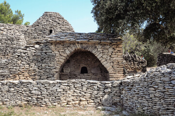 Poster - One of the dry stone huts in Village des Bories open air museum near Gordes village in Provence region of France