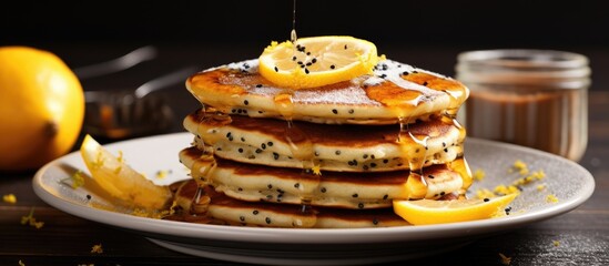 Poster - Indulgent Pancake Tower Drizzled with Sweet Syrup and Zesty Lemon Slices