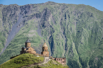 Poster - Tsminda Sameba - Trinity Church in Caucasus Mountains in Gergeti village near Stepantsminda in Georgia