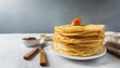 High-quality photo . Beautiful Stack of traditional Russian pancakes blini on gray background