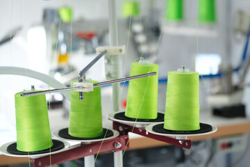 Aufkleber - Spools of color threads closeup, spinning machine