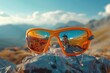 Sporty, bright orange wraparound sunglasses reflecting a dynamic mountain biking scene, perfect for an active lifestyle theme. 8k