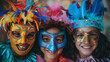 Three children wearing colorful masks and feathers are smiling for the camera