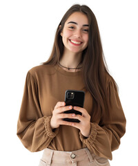 A young woman wearing casual brown clothes holds a mobile phone and smiles at the camera on a transparent background