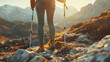 An image of a hiker from behind walking on a mountain trail, bathed in the golden light of the setting sun