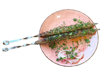 Poster - Shish kebab with meat in a plate isolated on a white background