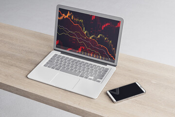 Sticker - Close up of laptop and smartphone on wooden desk with abstract downward red forex chart on blurry background. Crisis, recession and economic fall concept. 3D Rendering.