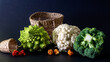 still life photo with photo of cauliflower, different colors and varieties of cauliflower
