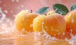 Ripe apricots on a pink background.