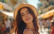 © imagineRbc - A multiracial woman wearing a hat striking a pose for a photograph