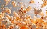 Fototapeta  - A bunch of popcorn kernels falling into the air, captured in motion with a high-speed camera