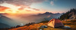 Camping tent at sunset light in beautiful mountains. nature camping theme
