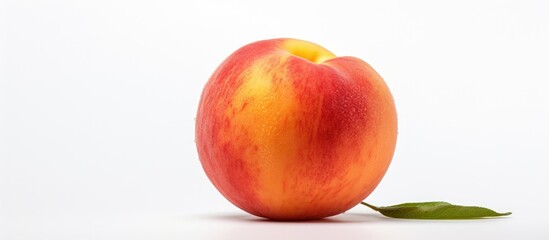 Poster - A red and yellow apple, a staple food and superfood, with a green leaf on a white background. Apples are natural foods and seedless fruits. They are a produce accessory fruit, along with peaches