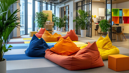 Wall Mural - Quiet corner with bean bags and plants in an open space office - wide format