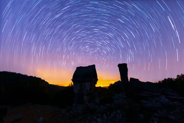 Wall Mural - Night astro photos of an ancient tomb in the ancient city of Xanthos, Antalya, Türkiye