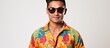 Stylish Man in Sunglasses and Casual Shirt Posing Confidently Outdoors