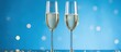 Two champagne glass on christmas bokeh background.