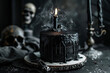 A gothic cake with black icing, a skull and a knife