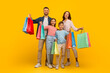 © Prostock-studio - Family Shopping. Joyful Young Parents And Their Kids Holding Bright Shopper Bags