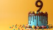 Birthday cake on a 9 years decorated with colorful sweets, chocolate, topper number nine on a yellow background. Copy space.